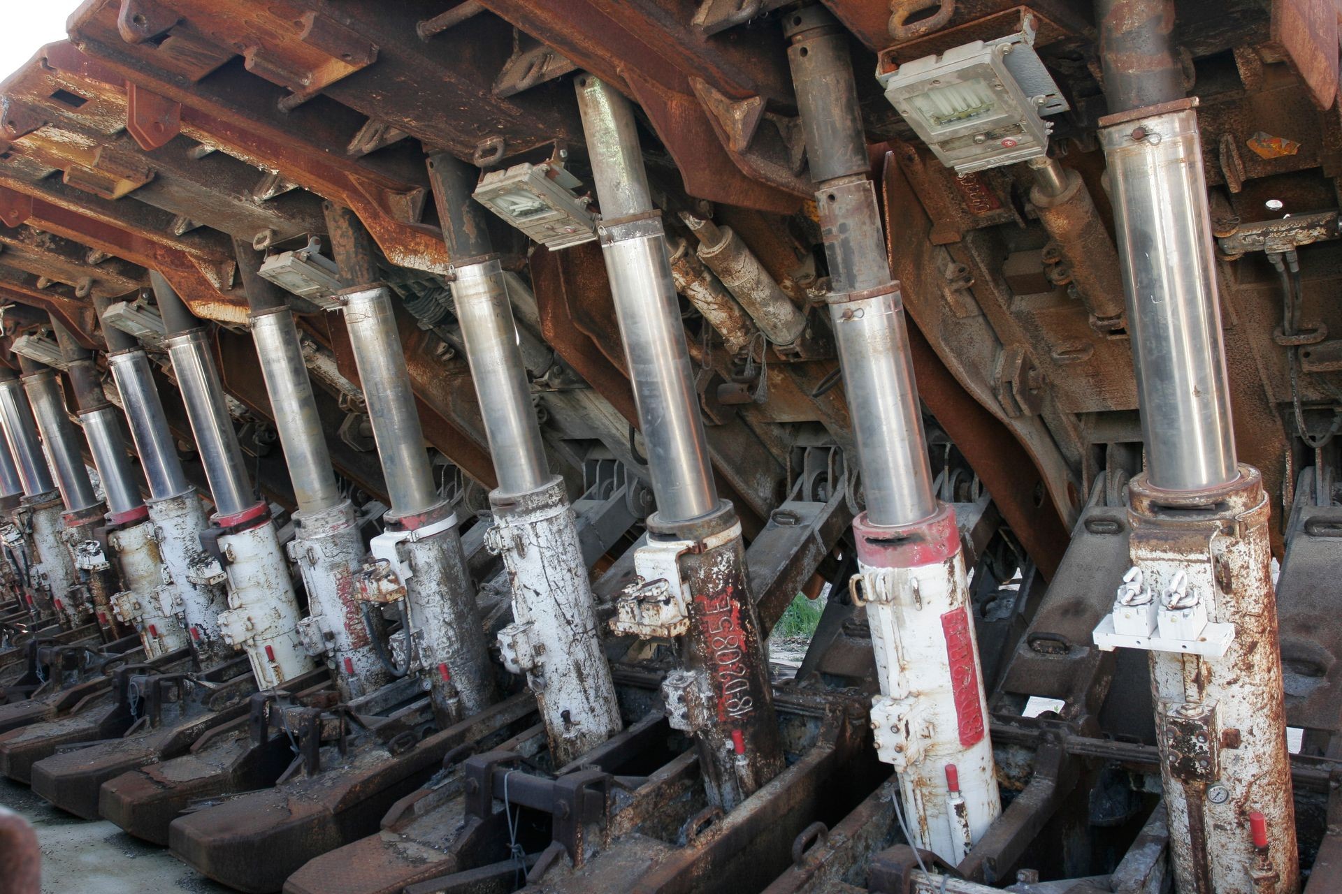 Hydraulic cylinders in abandoned coal mine.
